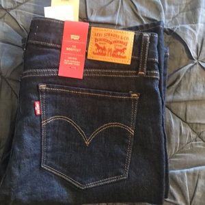 Levi’s 715 bootcut jeans dark rinse.